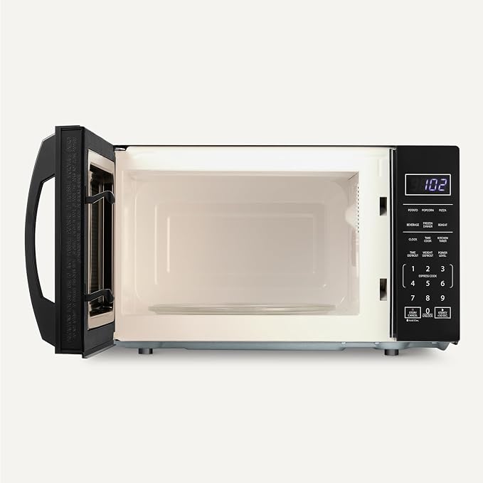 Amazon Basics Countertop Microwave Oven with LED Light and Child Lock, 700W, 0.7 Cu.ft, Black