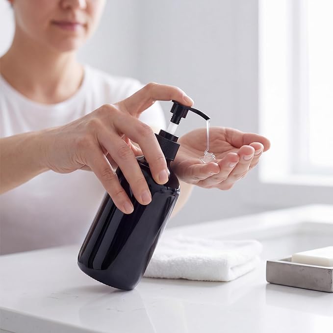 Tanlade Glass Pump Bottle Dispenser 4 oz Travel Bottles with Pump Refillable Glass Containers for Toiletries Lotion Liquid Soap Shampoo Essential Oils Cosmetic Travel Accessories(Black)