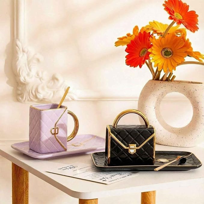 Zubebe 2 Set Coffee Mug Elegant Handbag Shaped Cup Modern Ceramic Purse Mug with Spoon and Saucer, 10oz Cute Creative Tea Cup for Woman Girls Gift (Purple,Black)