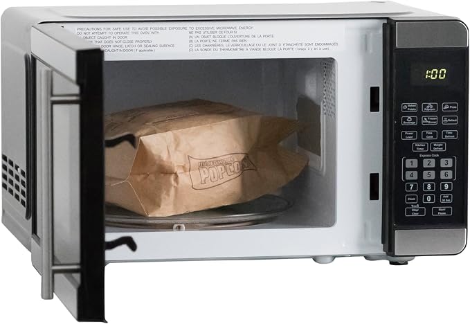West Bend Microwave Oven 700-Watts Countertop Footprint with 6 Pre Cooking Settings, Speed Defrost, Electronic Control Panel and Glass Turntable Perfect for Small Spaces, 0.7-Cu.Ft., Stainless Steel