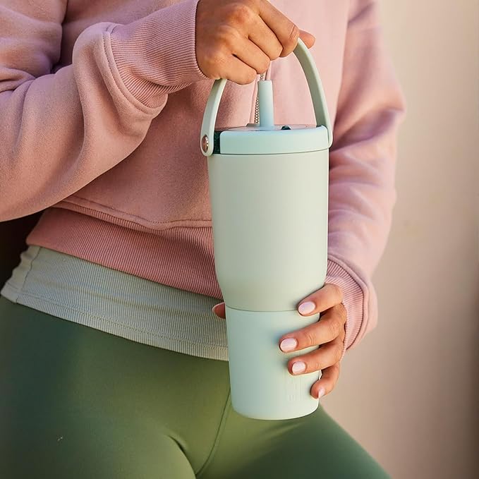 BrüMate Resa 35oz 100% Leakproof Tumbler w/Handle & Straw | Flexible SoftSip Straw | Silicone Sleeve for Durability | Stainless Steel | Cup Holder & Travel Friendly Water Bottle (Navy Polka Dots)