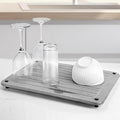 Stone Dish Drying Mats for Kitchen Counter 15.7"x 11.8" Quick Dry Stone Drying Mat Super Absorbent Diatomaceous Earth Drying Mat with 4 Non-Slip Stainless Steel Feet for Dishes&Cups Light Grey
