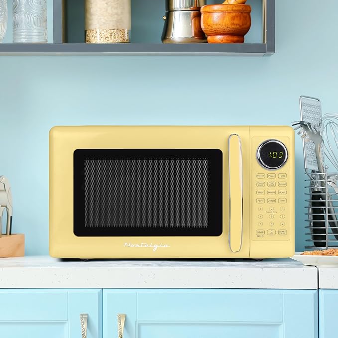 Nostalgia Modern Retro Compact Countertop Microwave Oven - 0.7 Cu. Ft. - 700-Watts with LED Digital Display - Child Lock - Easy Clean Interior - Yellow