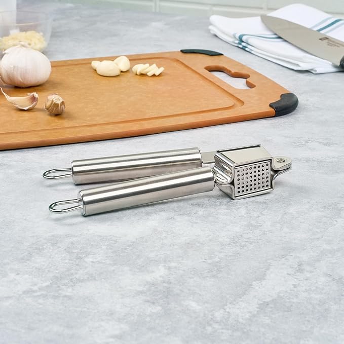 Restaurantware Stainless Steel Garlic Press - German Standard Garlic Mincer Tool Easy to Squeeze and Clean, Dishwasher Safe - Heavy Duty Garlic Chopper Tool for Ginger, Seeds