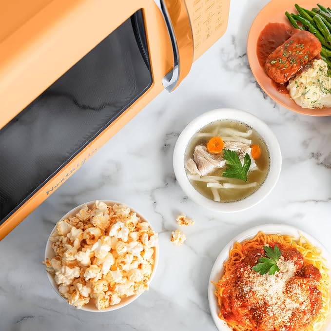 Nostalgia Modern Retro Compact Countertop Microwave Oven - 0.7 Cu. Ft. - 700-Watts with LED Digital Display - Child Lock - Easy Clean Interior - Orange