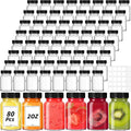 80 Pack 2 oz Glass Shot Bottles with Black Lids Small Clear Glass Jar for Ginger Shot Mini Juice Bottle Reusable Wide Mouth Travel Cup Leakage-Proof with Labels for Wellness Juice Milk Potion Liquids