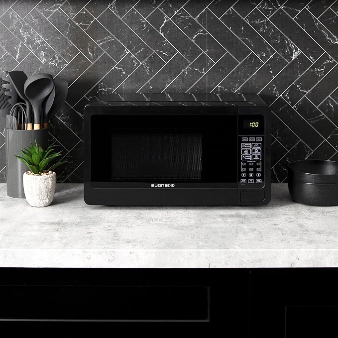 West Bend Microwave Oven 700-Watts Compact with 6 Pre-Set Cooking Settings, Speed Defrost, Electronic Control Panel and Glass Turntable, 0.7 Cu.Ft., Black