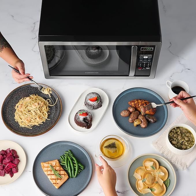Farberware 1.1 Cu. Ft. Countertop Microwave Oven – 1000 Watts Power, Auto Cook Settings, Defrost, Easy Clean and Child Safety Lock - Stainless